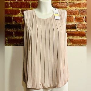 Women’s Calvin Klein tan top.